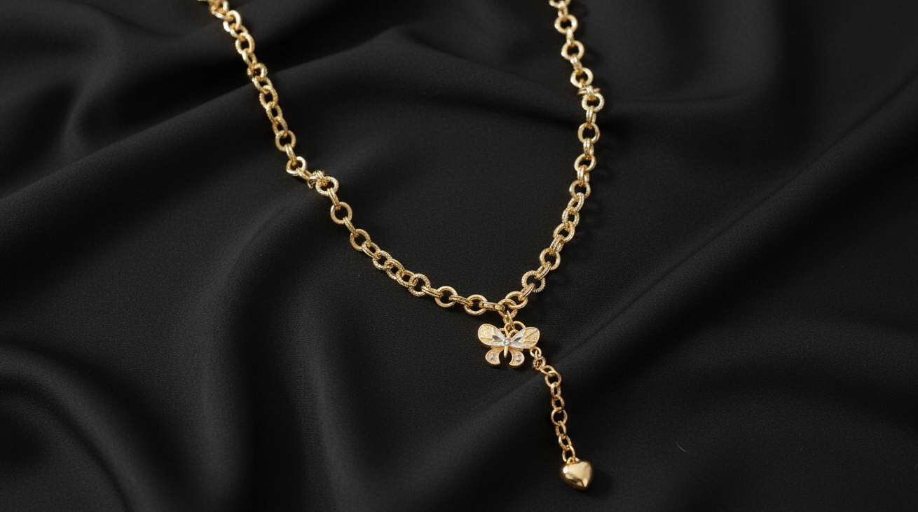 Golden Butterfly Charm Necklace with Heart Drop – Symbol of Grace & Freedom