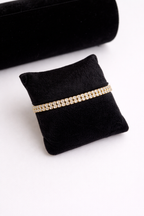 Double Row Diamond-Studded Gold Bracelet with Tassel Chain
